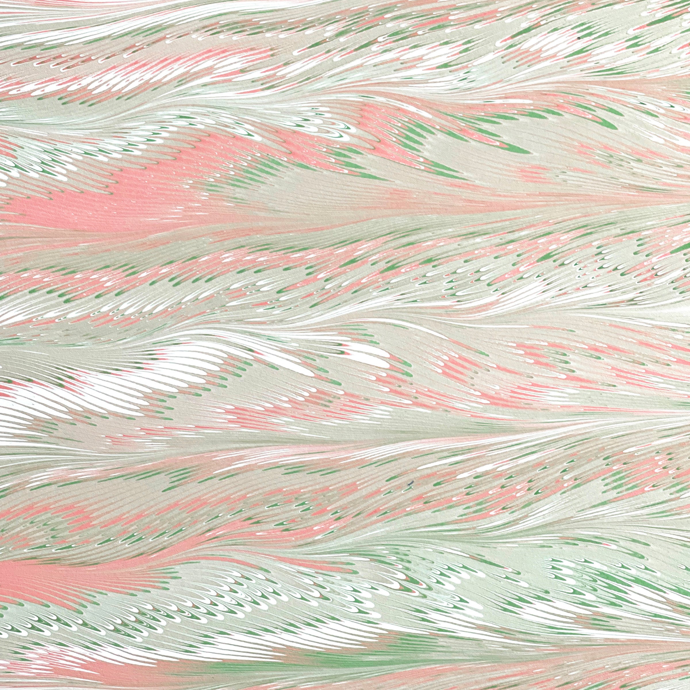 A feathered pattern pink, green, tan, and ivory.