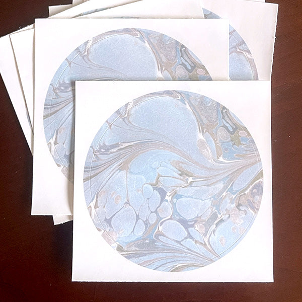  'Aquatic Elegance' stickers in an organic blue pattern are available in two sizes, perfect for adding an elegant touch to envelopes, gifts, and more. Our stickers coordinate with the matching notecards.
